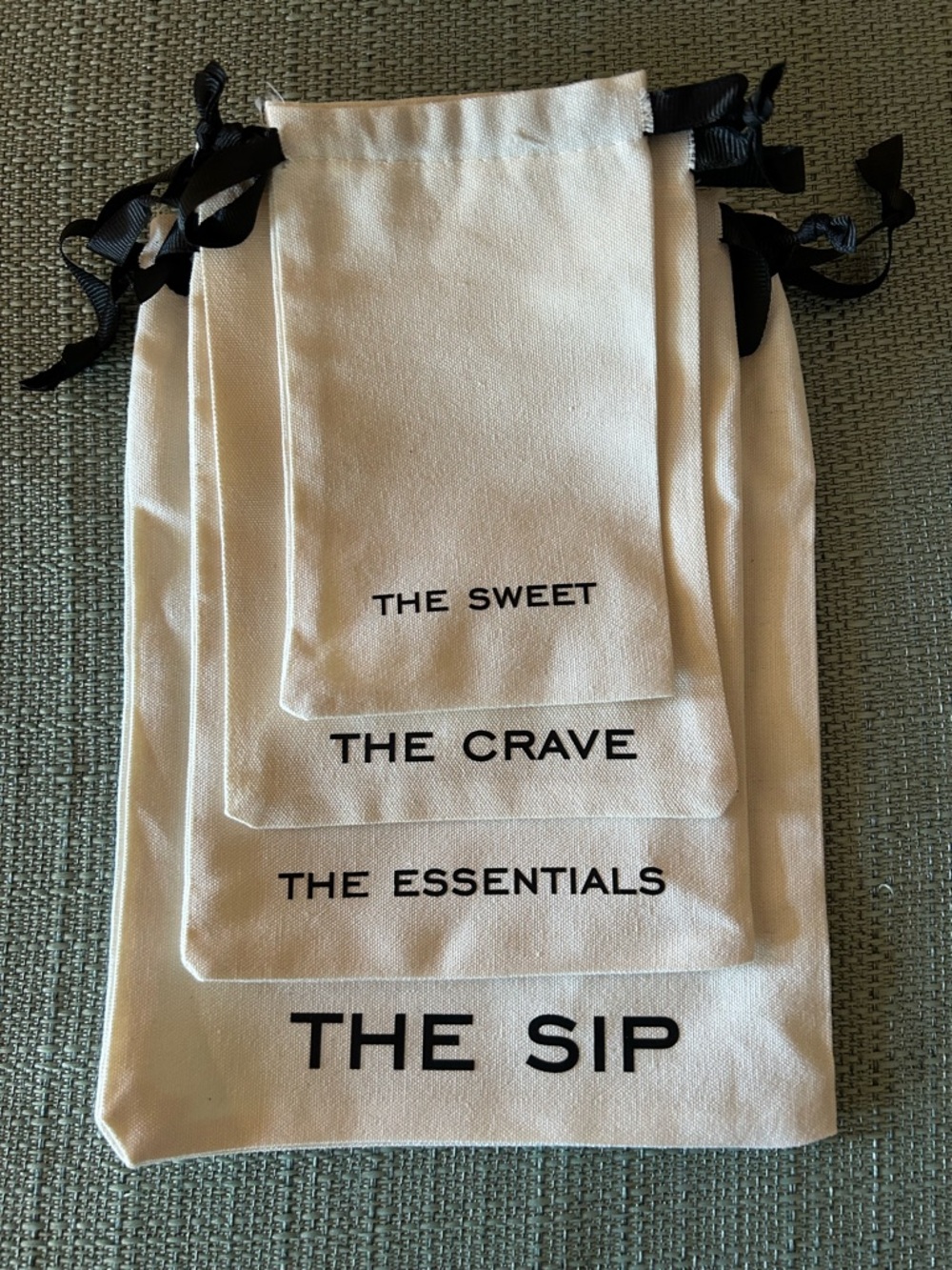 Four Canvas Drawstring Pouches: THE SIP / THE ESSENTIALS / THE CRAVE / THE SWEET